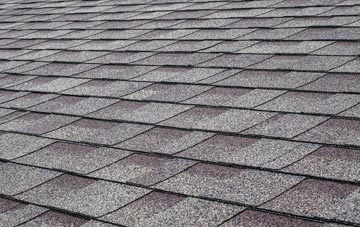Spring End tiles for shallow pitch roofing